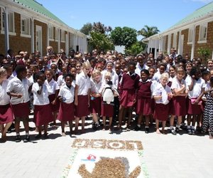 Okkie Smuts children donate money to APSS